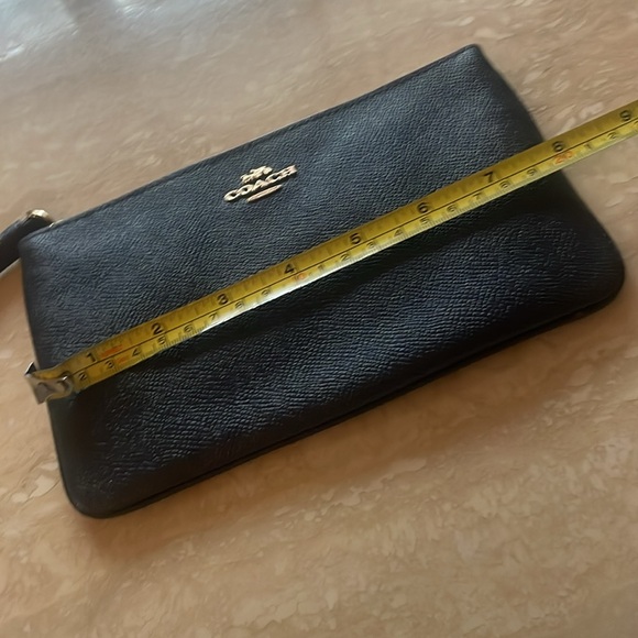Coach LIKE NEW Wallet Wristlet 5” x 8”
Gold hardware - Picture 10 of 11